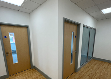 interior_of_building_hallway_with_wood_floor